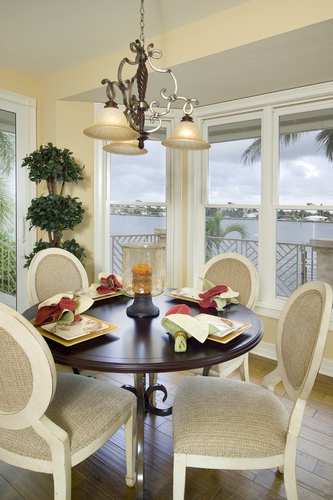 This is an example of a tropical dining room in Miami.