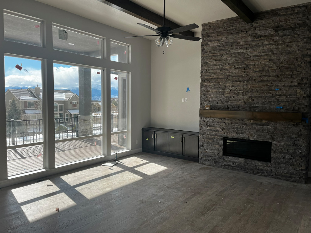 Transitional home design photo in Denver