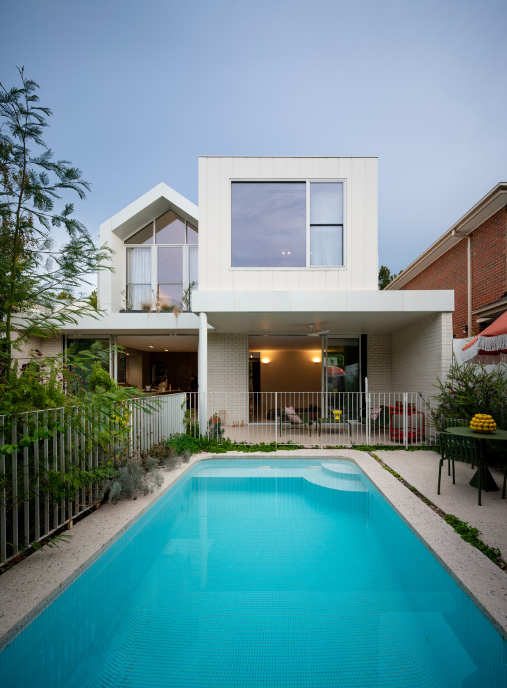 Inspiration for a midcentury pool in Melbourne.