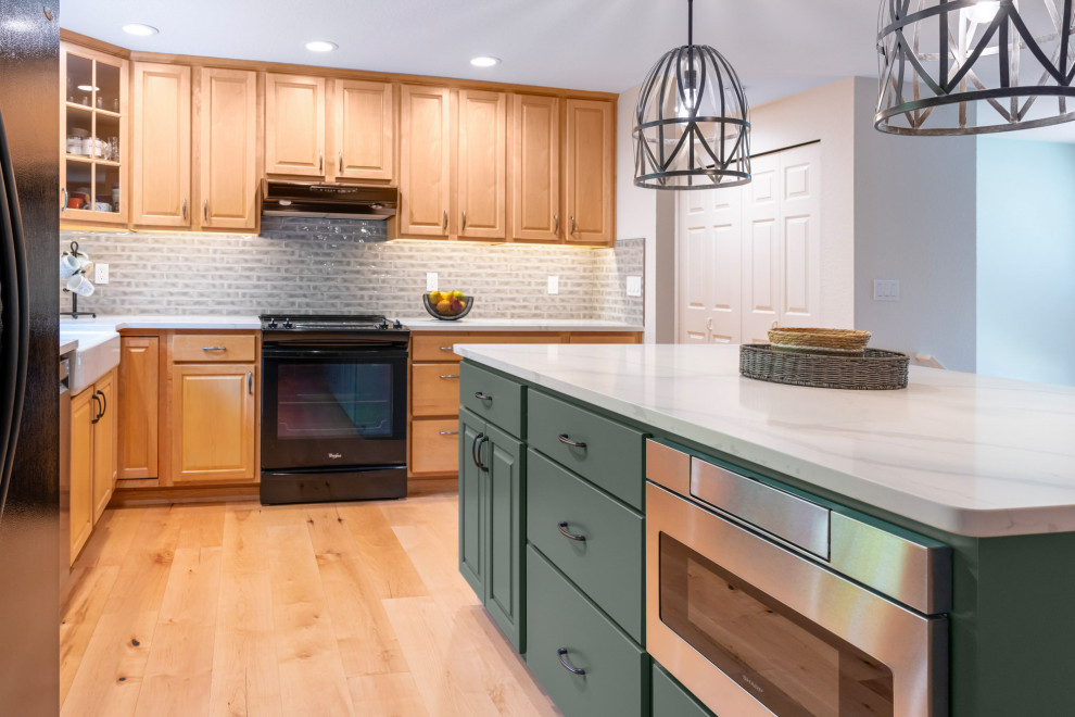 Example of a transitional kitchen design in Seattle