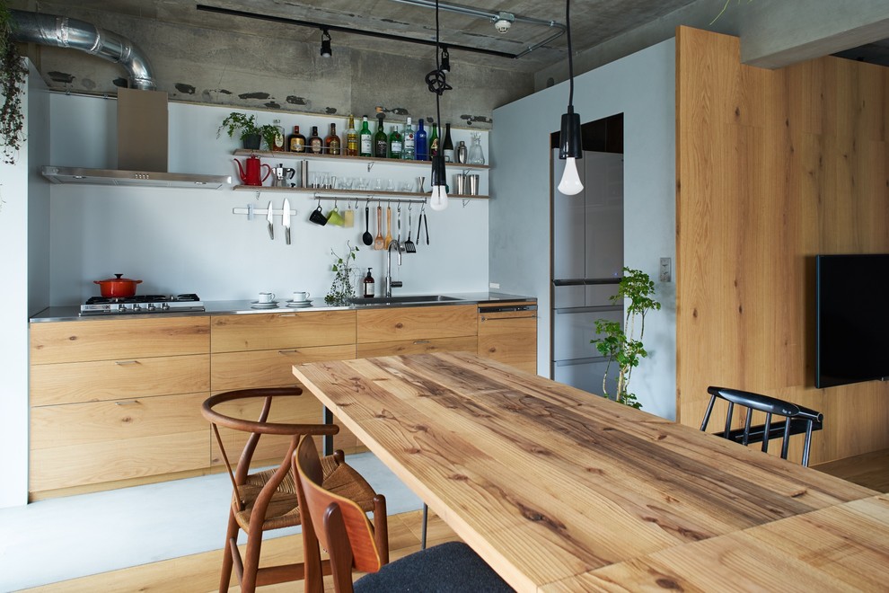 Inspiration for an industrial open plan dining in Other with multi-coloured walls and multi-coloured floor.