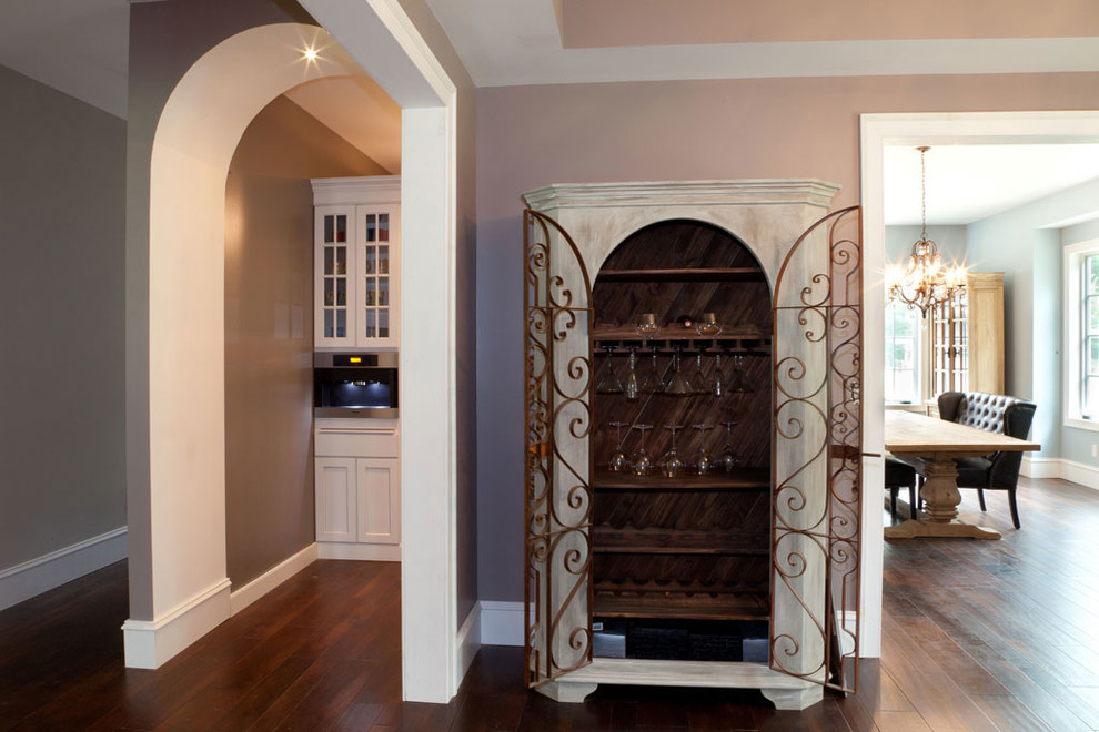 This is an example of a large transitional home bar in DC Metro.