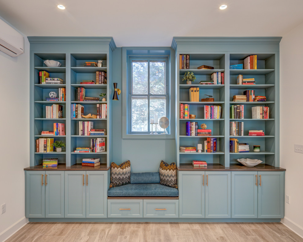 Mid-sized transitional enclosed and walk-out brown floor and porcelain tile basement photo with white walls and no tv