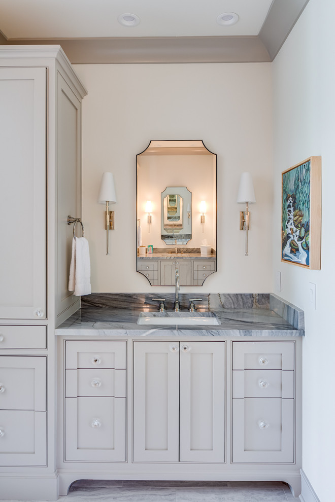 Bathroom - large transitional white tile gray floor and single-sink bathroom idea with furniture-like cabinets, gray cabinets, white walls, granite countertops, blue countertops and a built-in vanity
