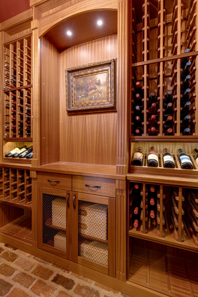 Secret passageway wine cellar. Basement layout with all mahogany racking.