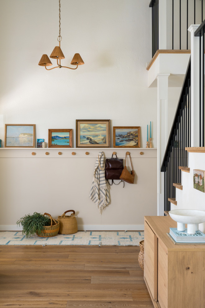 Example of a small eclectic entryway design in San Diego