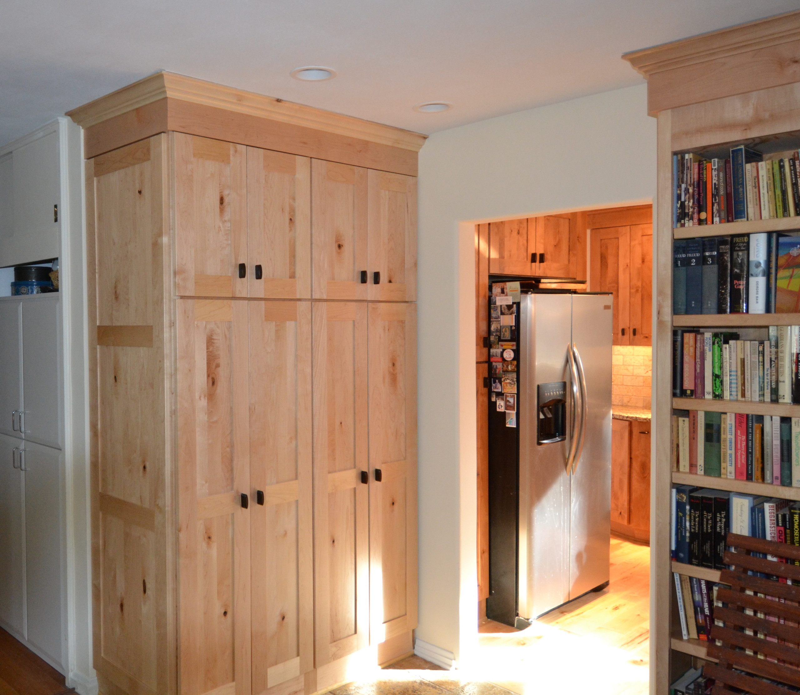 Kitchen with knotty alder cabinets