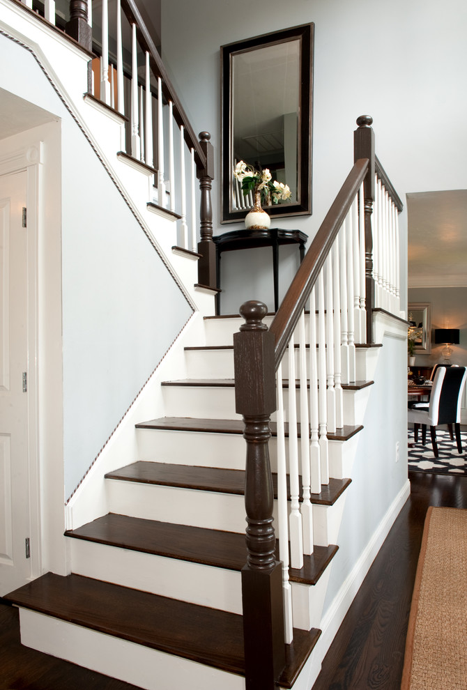 This is an example of a traditional wood u-shaped staircase in Boston.