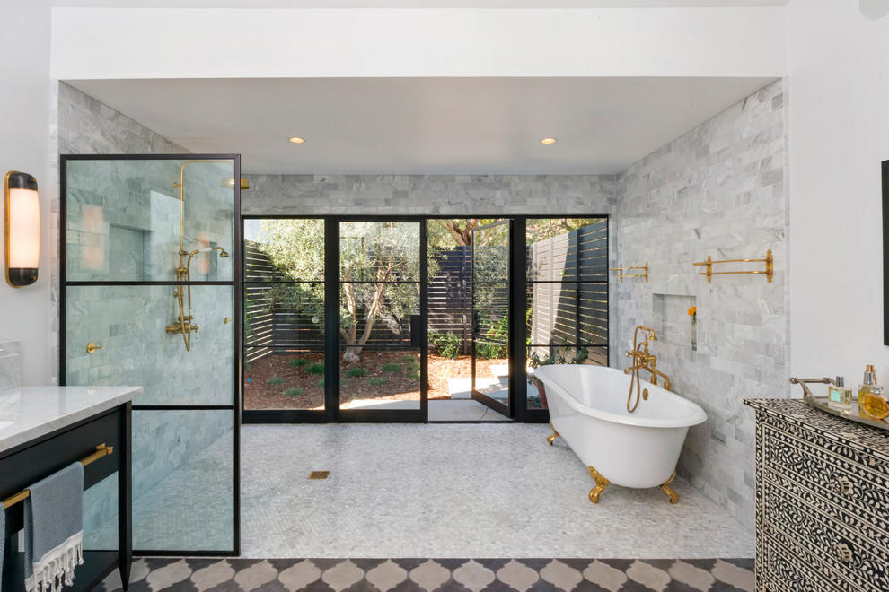 Inspiration for a contemporary master bathroom in Los Angeles with black cabinets, gray tile, grey walls, ceramic floors, a pedestal sink, wood benchtops, brown floor, white benchtops and flat-panel cabinets.