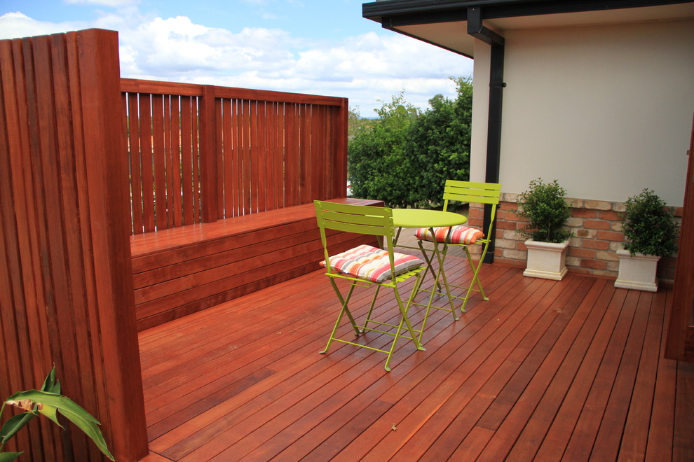 Photo of a small contemporary backyard deck in Brisbane with no cover.