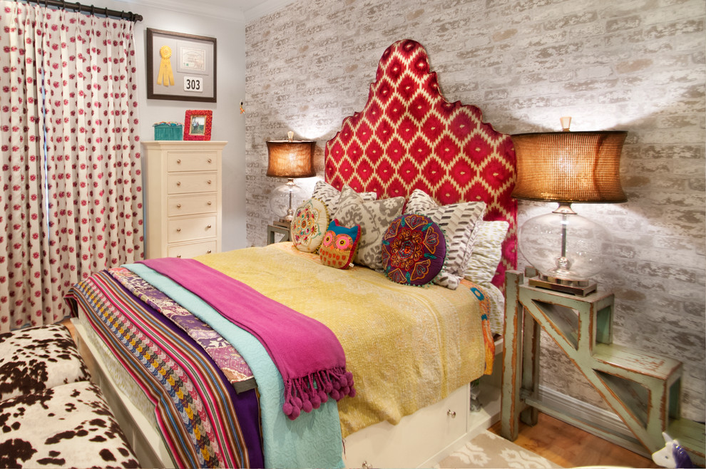 Inspiration for an eclectic bedroom in Orlando with grey walls.
