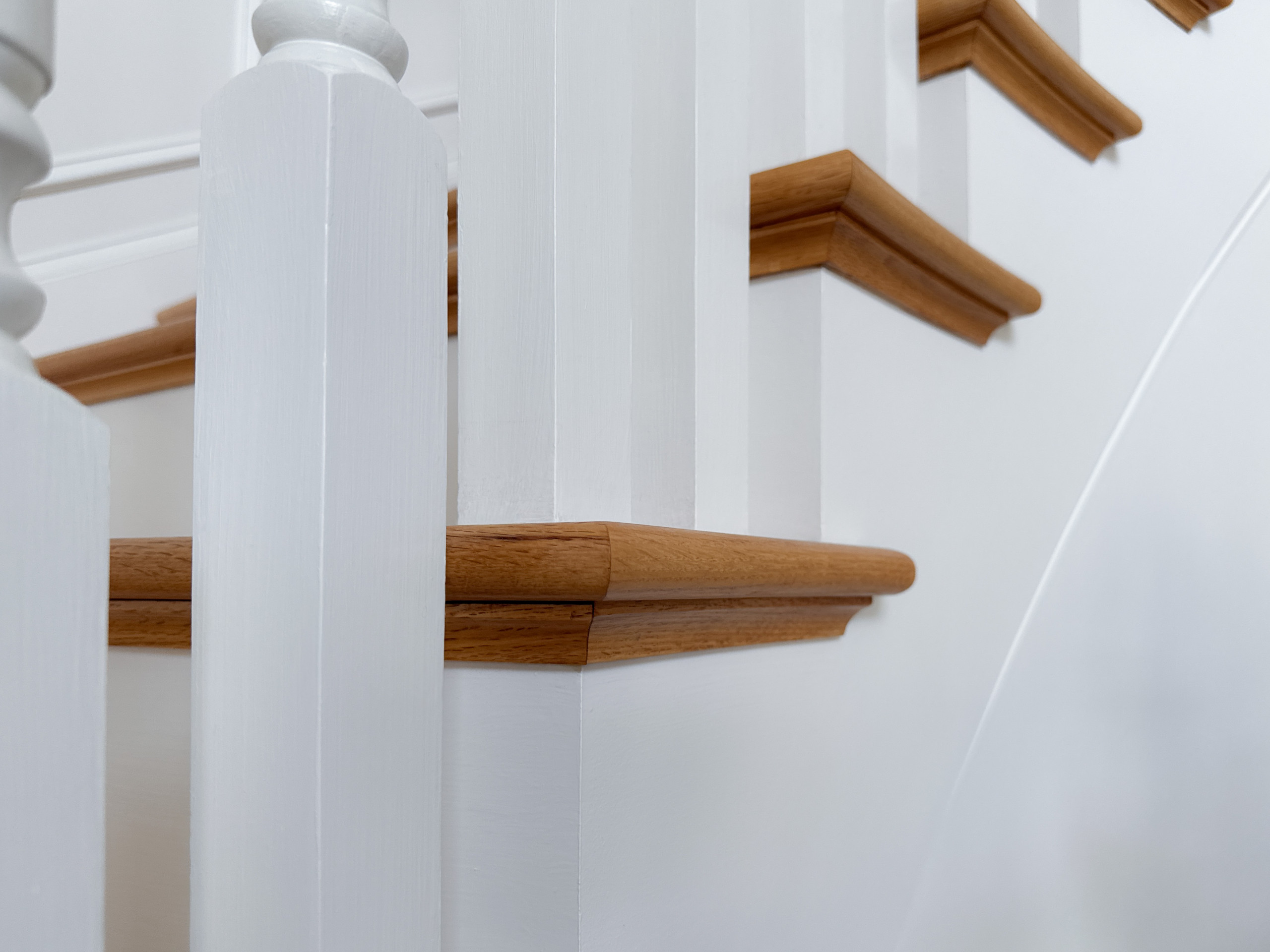 Project #161 | Curved Red Oak Foyer Staircase, 26 Years Later