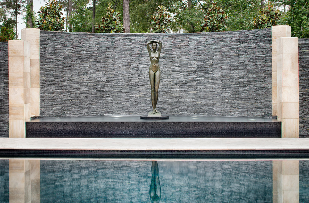 Huge transitional backyard custom-shaped pool fountain photo in Houston