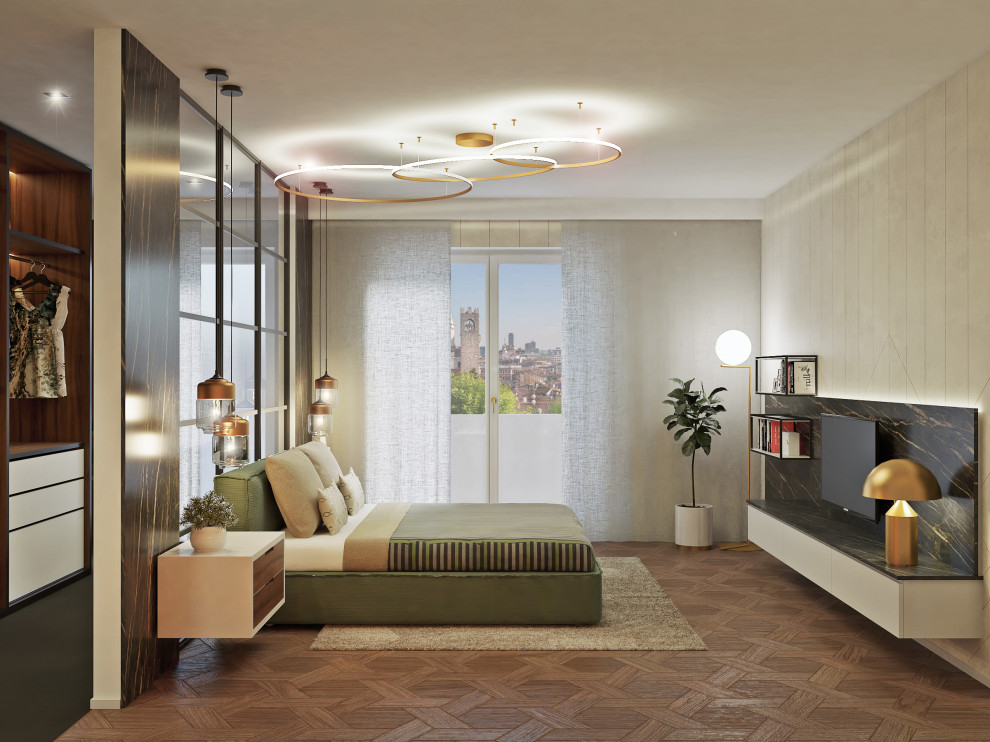 Photo of a large modern master bedroom in Milan with beige walls, light hardwood floors, a hanging fireplace, a metal fireplace surround and brown floor.