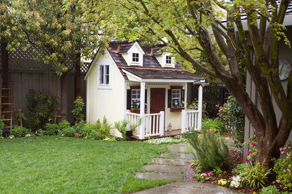 This is an example of a traditional garden in San Francisco with with outdoor playset.