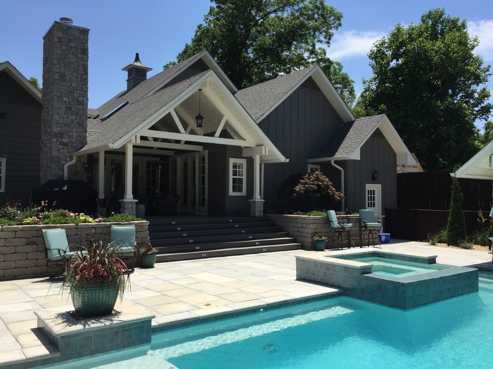 Large transitional backyard patio photo with a fire pit, decking and a roof extension