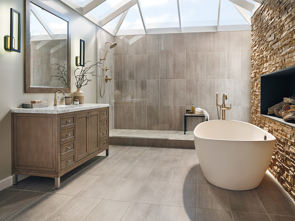 Freestanding bathtub - huge transitional master beige tile and stone tile beige floor freestanding bathtub idea in Indianapolis with medium tone wood cabinets and marble countertops