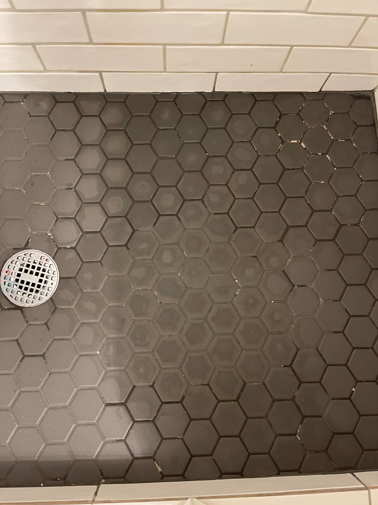 Why does my shower tile smelly funny