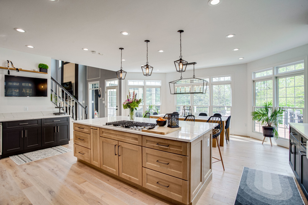Inspiration for a large classic u-shaped kitchen/diner in DC Metro with a belfast sink, engineered stone countertops, stainless steel appliances and an island.
