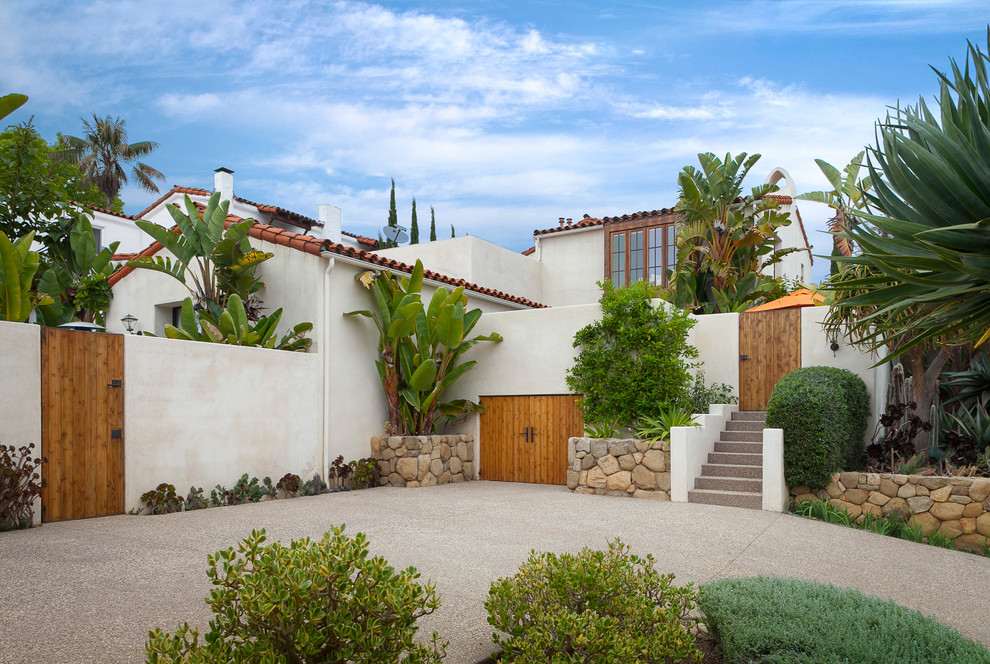 Design ideas for a mediterranean one-storey white exterior in Santa Barbara.