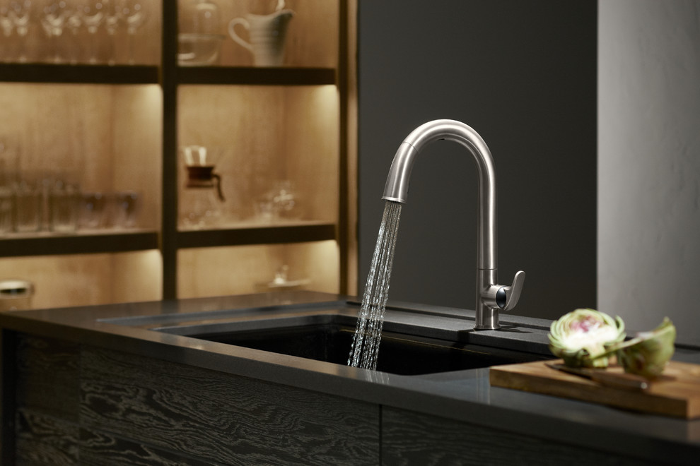 Kitchen - industrial kitchen idea in Miami with granite countertops and brick backsplash