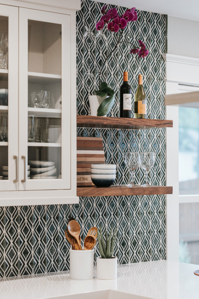 Example of a transitional kitchen design in Denver