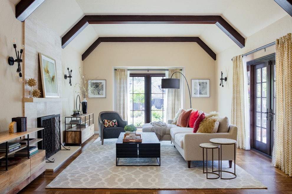 Design ideas for a transitional formal open concept living room in San Francisco with beige walls, dark hardwood floors, a standard fireplace and brown floor.