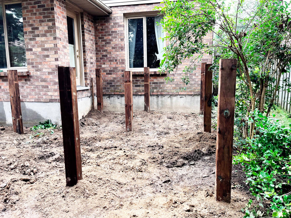 Photo of a wood fence landscaping for spring.