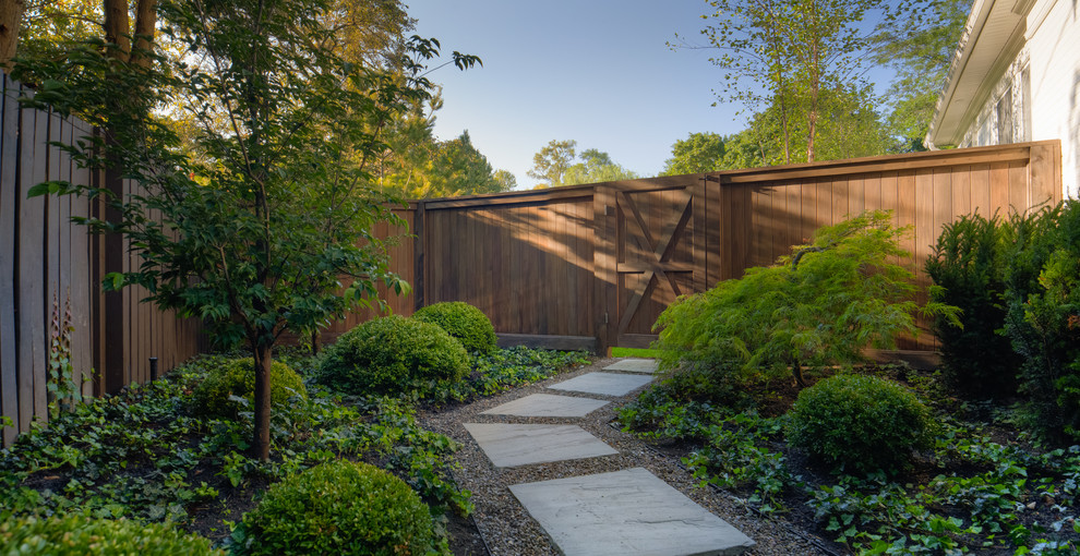 Example of a transitional exterior home design in Toronto