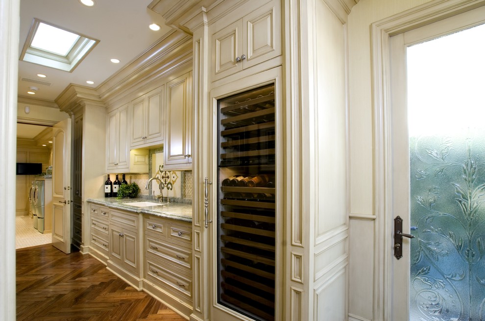 Design ideas for a traditional kitchen in Orange County with marble benchtops.