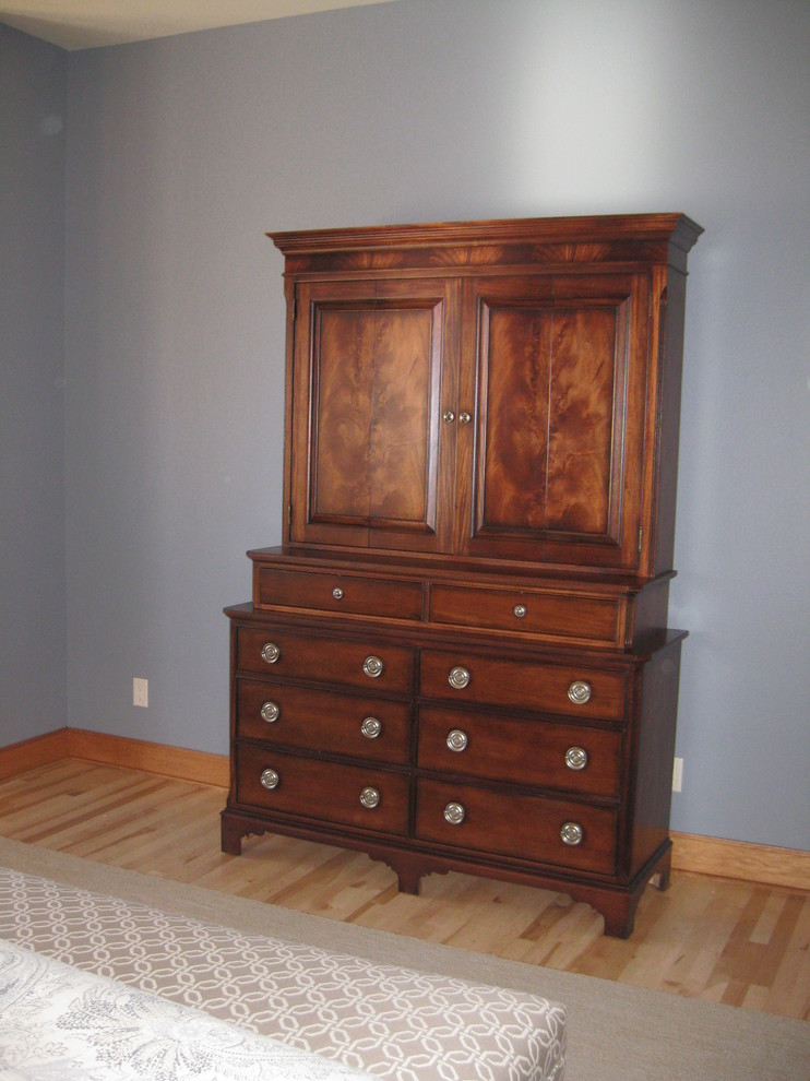 Bedroom - large transitional master bedroom idea with brown walls