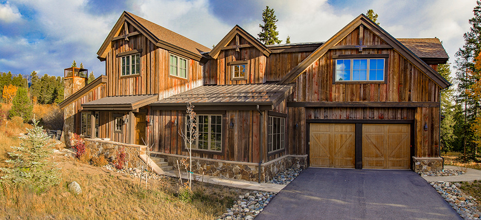 Mountain style home design photo in Denver