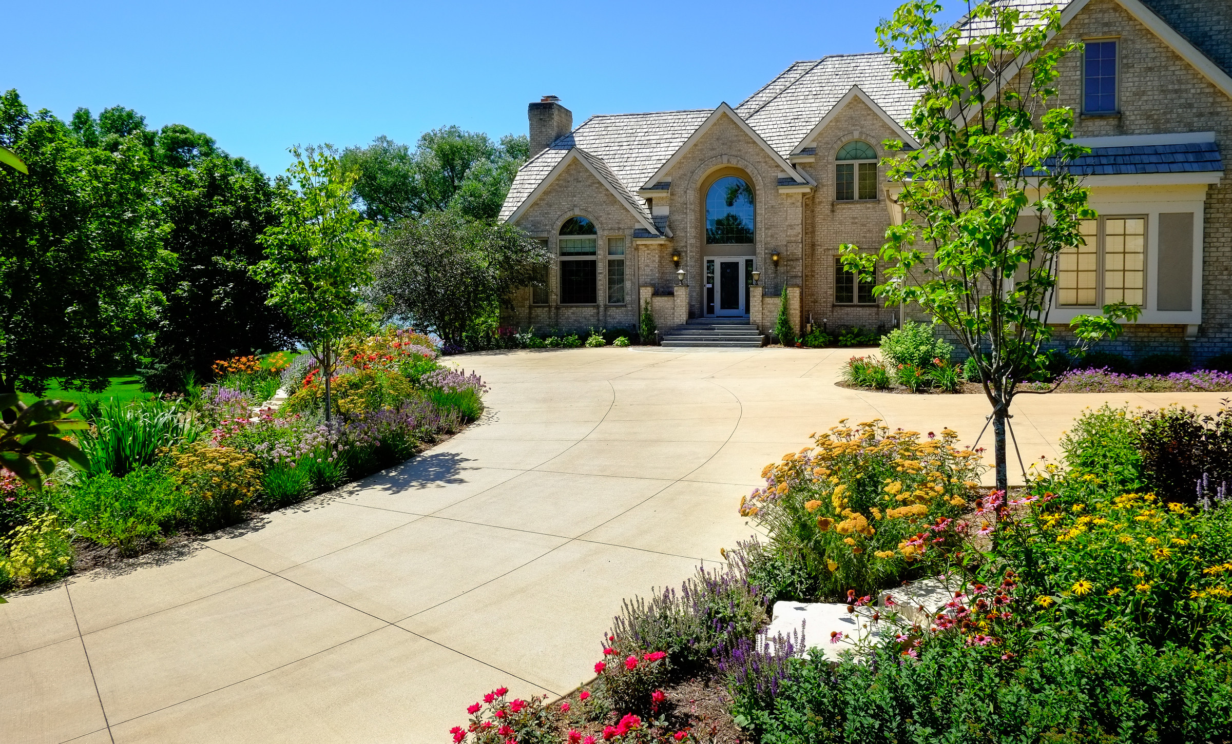 Lake Home Colored Concrete Driveway - Oconomowoc