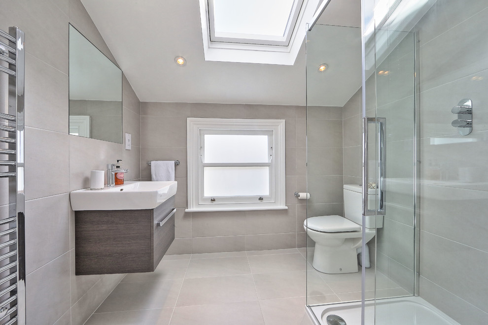 This is an example of a contemporary bathroom in Other with white walls.