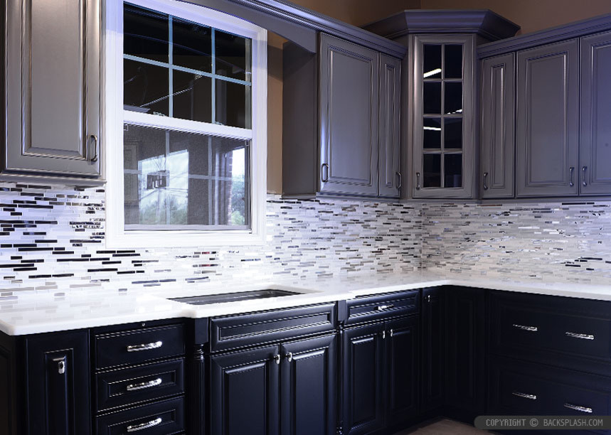 Mid-sized eclectic l-shaped kitchen photo in Denver with raised-panel cabinets, dark wood cabinets, quartz countertops and glass tile backsplash