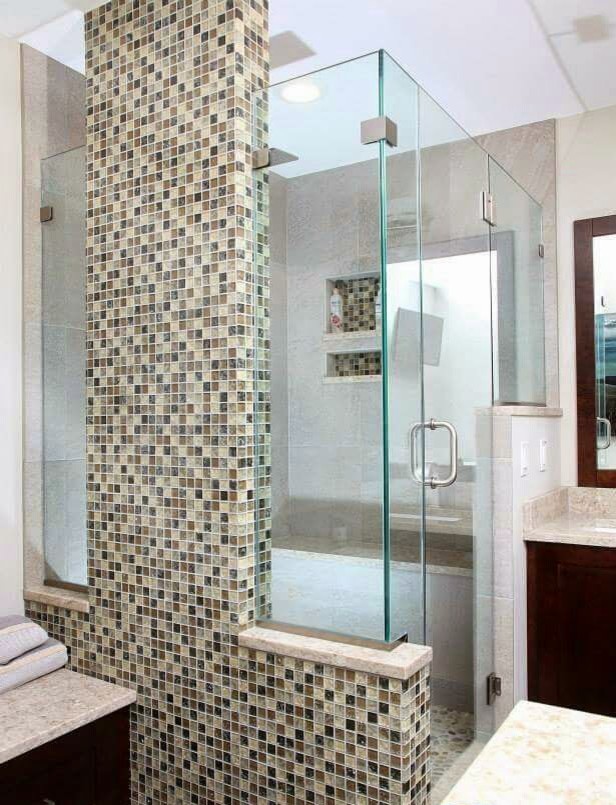 Design ideas for a mid-sized contemporary master bathroom in New York with an undermount sink, shaker cabinets, dark wood cabinets, engineered quartz benchtops, a drop-in tub, a corner shower, a one-piece toilet, multi-coloured tile and grey walls.