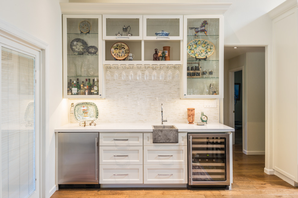 Design ideas for a transitional single-wall wet bar in Phoenix with shaker cabinets and white cabinets.