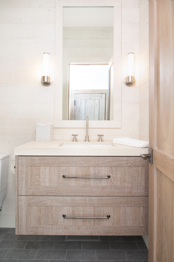 Mid-sized mountain style single-sink bathroom photo with shaker cabinets and a floating vanity