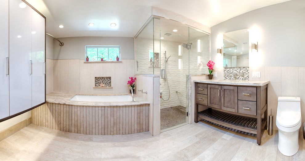 Inspiration for a large transitional master bathroom in Philadelphia with an undermount sink, furniture-like cabinets, dark wood cabinets and a corner shower.