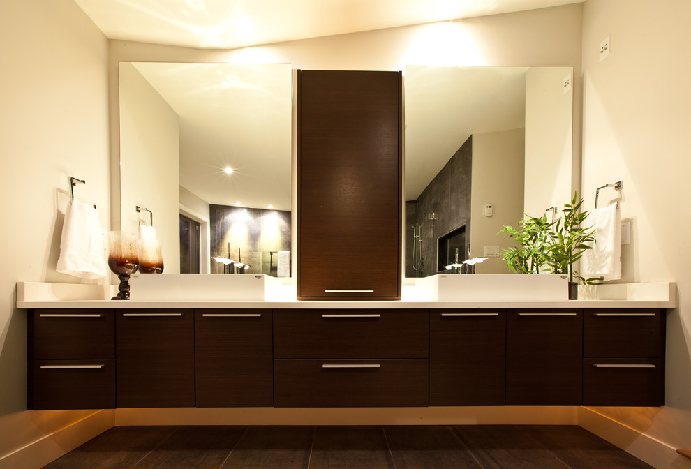 Design ideas for a modern bathroom in Vancouver with a vessel sink, dark wood cabinets, quartzite benchtops, black tile, stone slab, beige walls and slate floors.