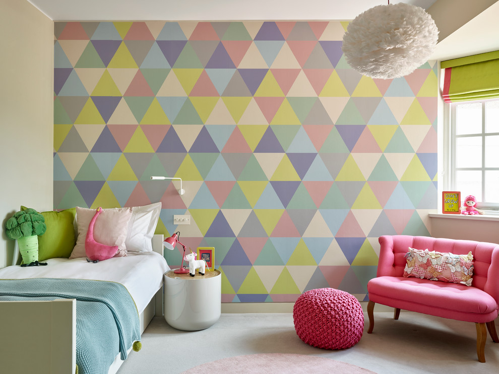 Design ideas for a contemporary kids' bedroom for kids 4-10 years old and girls in London with multi-coloured walls.