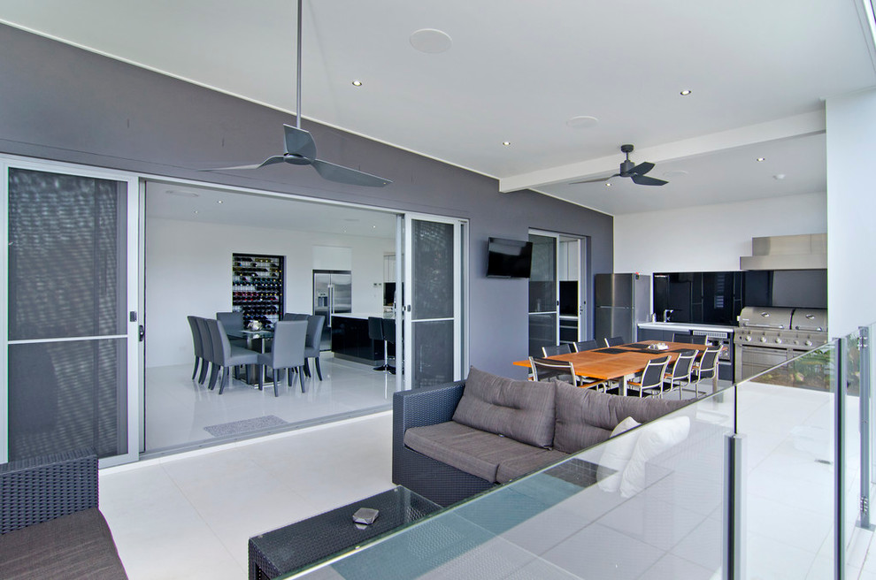 This is an example of a contemporary patio in Gold Coast - Tweed.