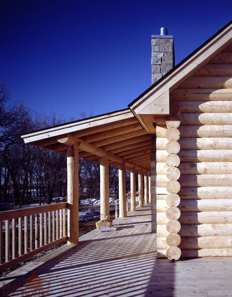 This is an example of a country verandah in Burlington with a roof extension.
