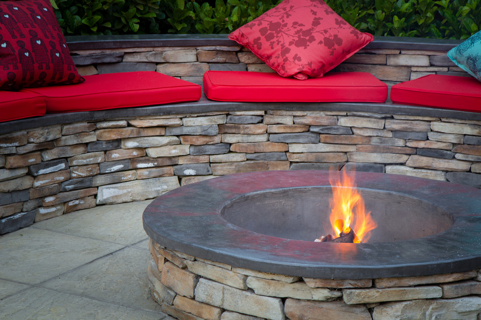 Inspiration for a rustic backyard concrete paver full sun patio remodel