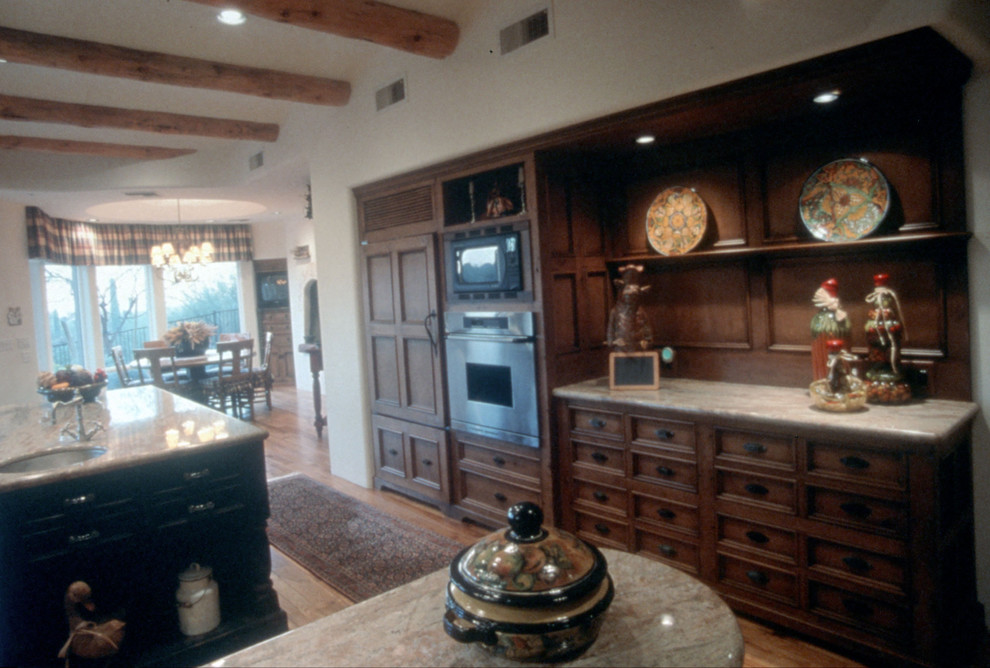 Example of a mountain style home design design in Phoenix