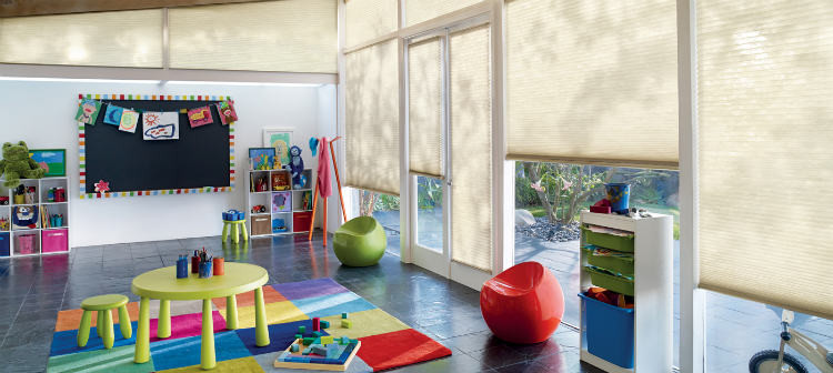 Inspiration for a mid-sized contemporary gender-neutral kids' playroom for kids 4-10 years old in Toronto with white walls, ceramic floors and grey floor.