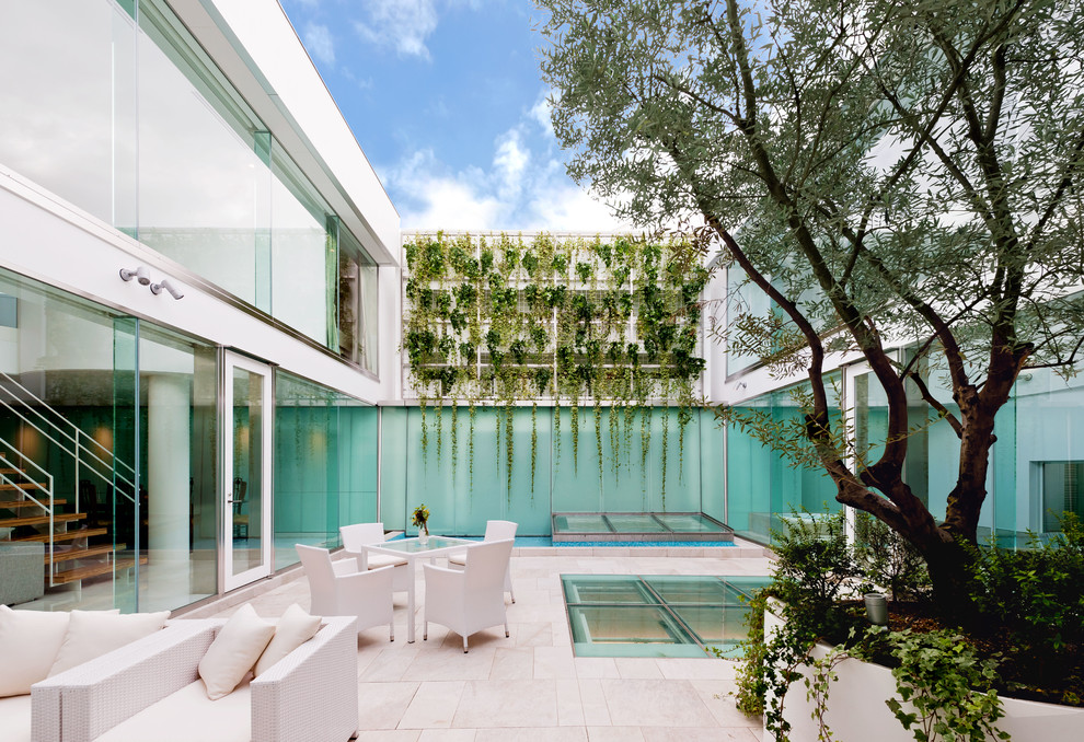 水を湛える都会のオアシス Contemporary Patio Tokyo By Earnest Architects 水を湛える都会のオアシス Contemporary Patio Tokyo By Earnest Architects