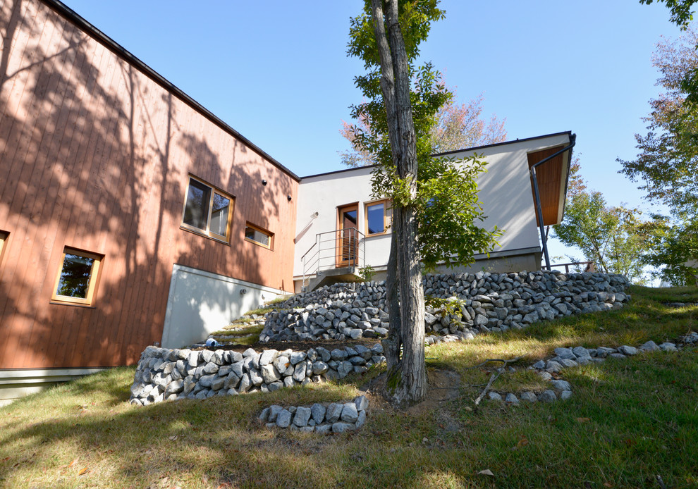 傾斜地の家 Scandinavian Exterior By 株式会社 シーンデザイン建築設計事務所 傾斜地の家 Scandinavian Exterior By 株式会社 シーンデザイン建築設計事務所