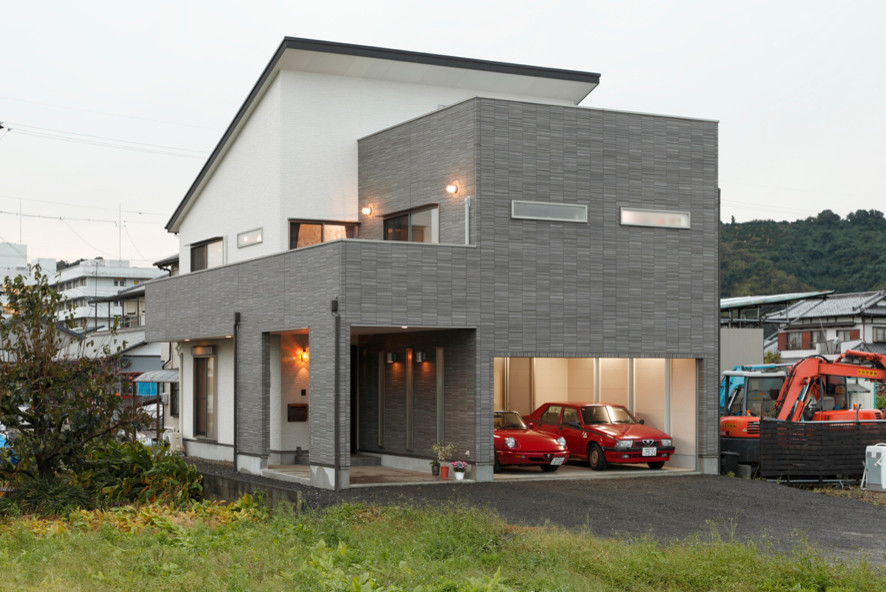 車が２台収まるビルインガレージのある家 Modern Exterior Other By 株式会社カラフルホームスタイル Houzz