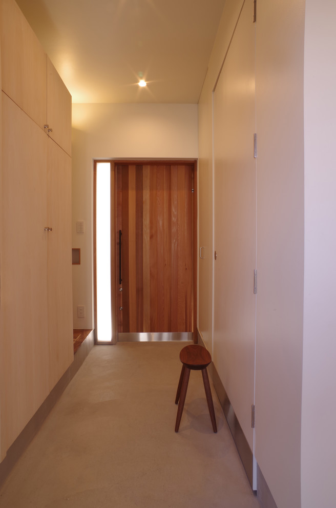 玄関の土間空間は ベビーカーを置いたり子供のおもちゃが登場したり 生活を受けとめる外でも中でもない場所 Scandinavian Entry By 川澄一代建築設計事務所 Houzz